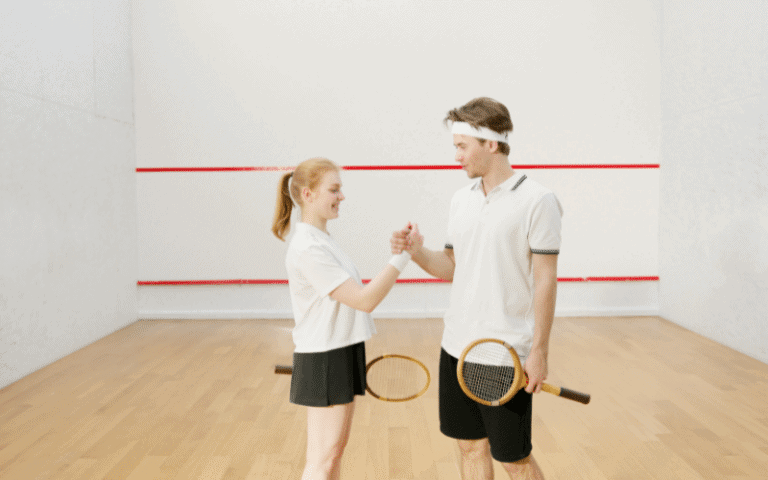 A group of young squash players in action on the court, with intense focus and swift movements