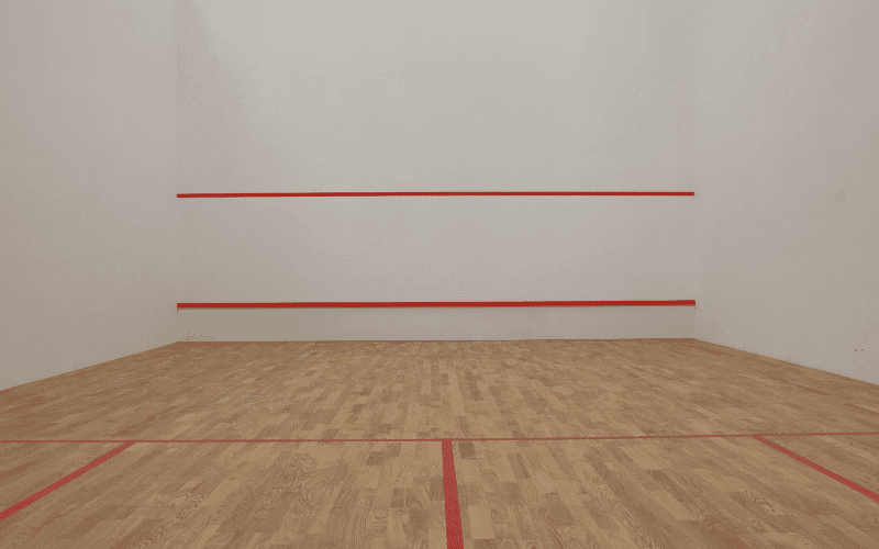 A modern squash court with youth-friendly facilities and infrastructure for junior squash players